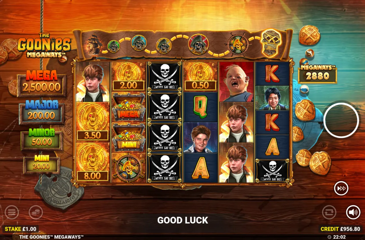 Four pirate flags across reels 3 and 4 with MEGA and MINI jackpot chests on reel 2